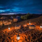 Traditional Berber desert camp with tents in Merzouga at night